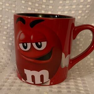 Red M&M'S coffee mug, 4 inches tall. Approximately 4 inch diameter.